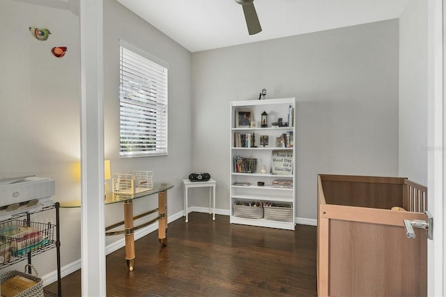 interior space featuring ceiling fan and dark hardwood / wood-style floors