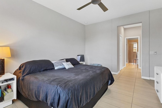 bedroom featuring light tile patterned floors and ceiling fan