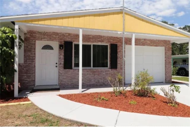 view of front of home with a garage