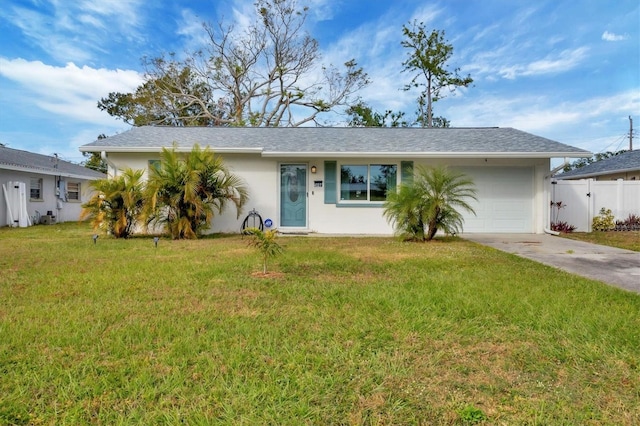 ranch-style house with a front lawn and a garage