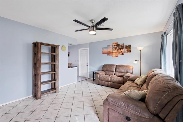 tiled living room with ceiling fan