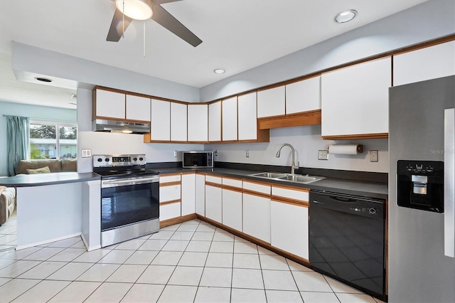 kitchen with appliances with stainless steel finishes, white cabinetry, ceiling fan, and sink