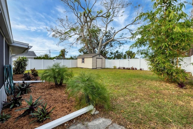 view of yard featuring a storage unit