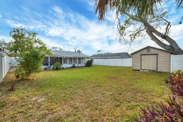 view of yard with a storage shed