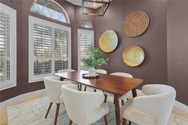 dining area featuring baseboards