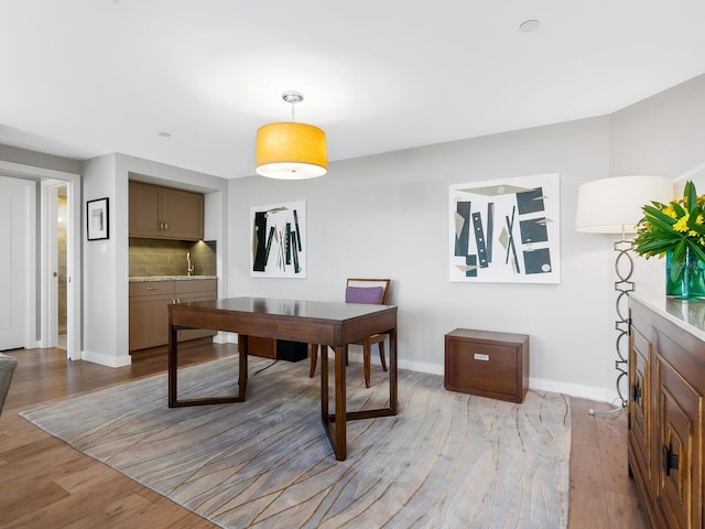 dining area with light wood-type flooring