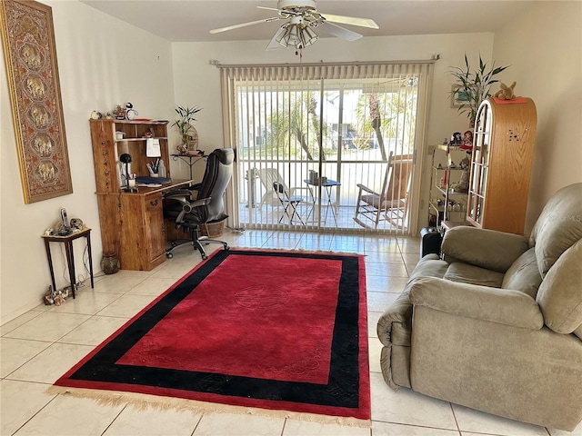 tiled living room featuring ceiling fan