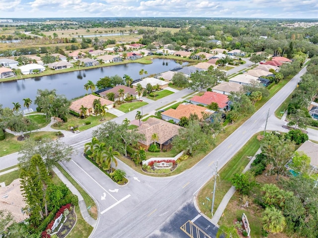 drone / aerial view with a water view