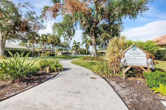 surrounding community featuring a lawn