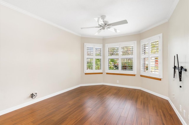 unfurnished room with hardwood / wood-style floors, ornamental molding, and ceiling fan