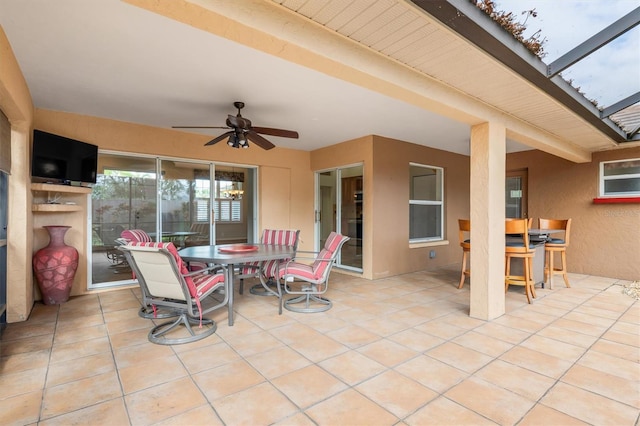 view of patio / terrace featuring ceiling fan