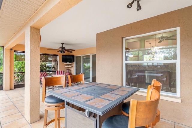 view of patio / terrace with ceiling fan