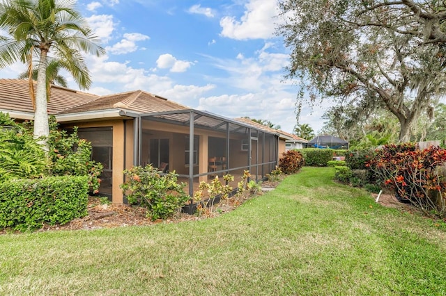 view of yard with a lanai