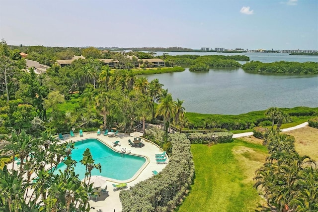 exterior space featuring a yard, a patio, and a water view