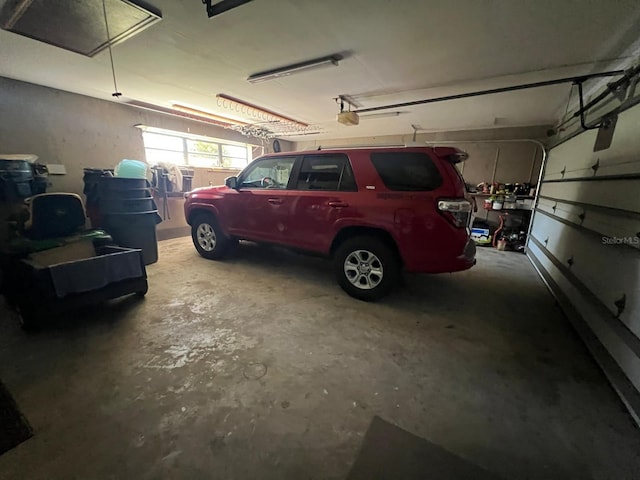 garage featuring a garage door opener