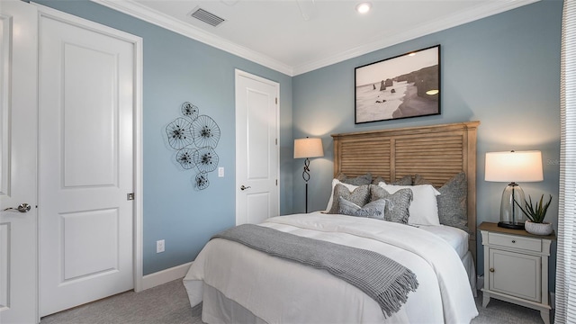 carpeted bedroom featuring crown molding