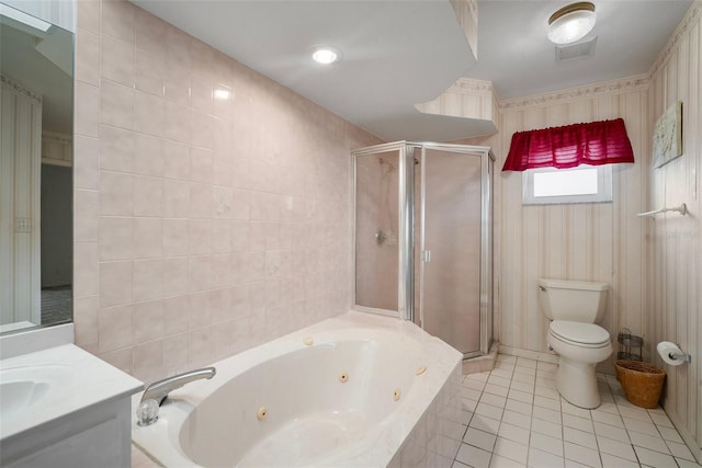 full bathroom featuring tile patterned floors, vanity, separate shower and tub, tile walls, and toilet