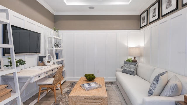 office space featuring crown molding and light hardwood / wood-style flooring