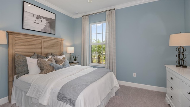 carpeted bedroom with ornamental molding and multiple windows