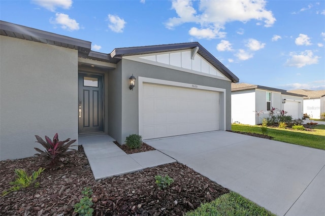 ranch-style house featuring a garage