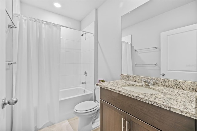 full bathroom featuring vanity, toilet, and shower / bath combo with shower curtain