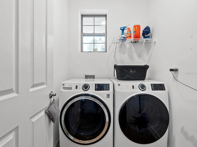 laundry area with washer and dryer