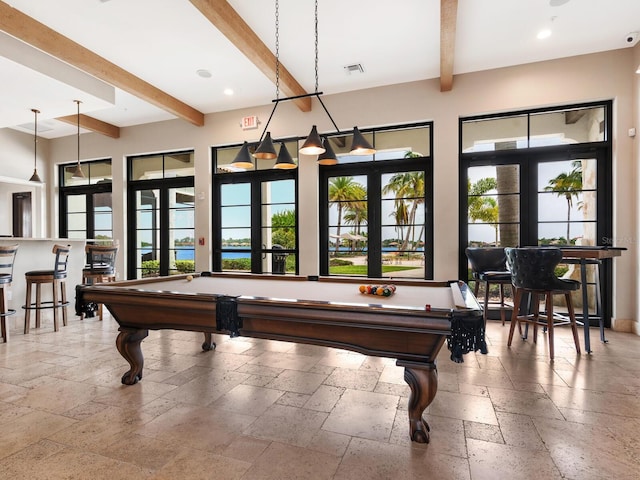 game room with beamed ceiling, pool table, and french doors