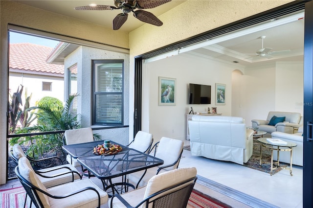 interior space featuring ceiling fan