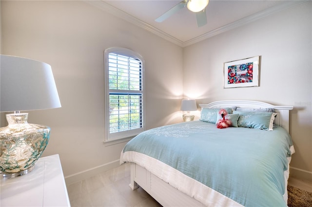 bedroom with ceiling fan and crown molding