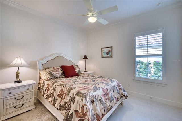 bedroom featuring ceiling fan and crown molding