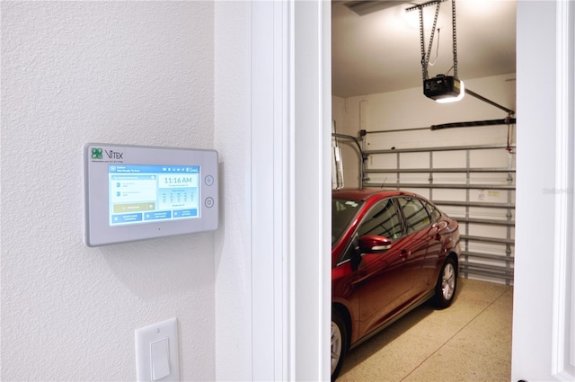 garage featuring a garage door opener