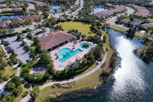 drone / aerial view with a water view