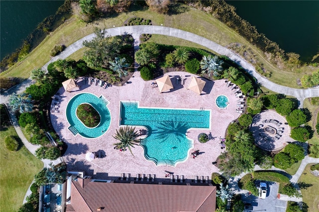 birds eye view of property featuring a water view