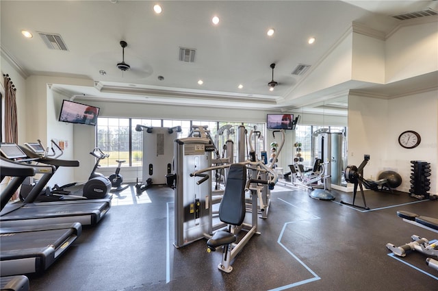 exercise room with vaulted ceiling, ceiling fan, and crown molding