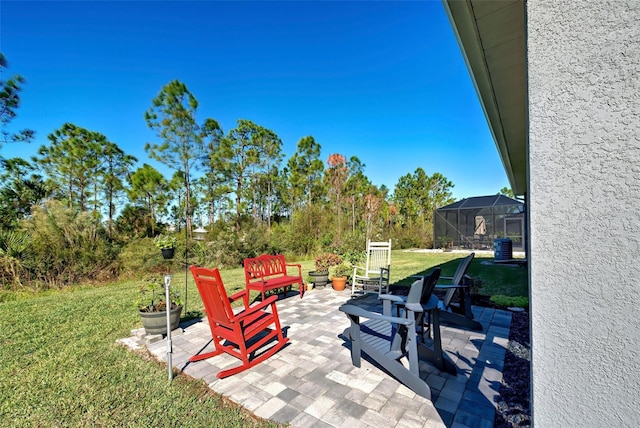 view of patio with a lanai