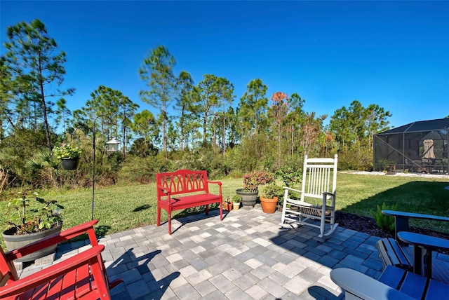 view of patio with a lanai