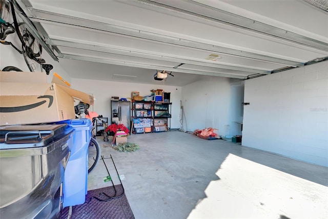 garage featuring a garage door opener