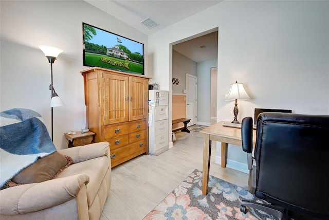 office space featuring light hardwood / wood-style flooring