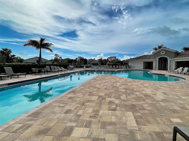 view of pool featuring a patio area