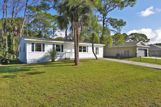 single story home featuring a front yard