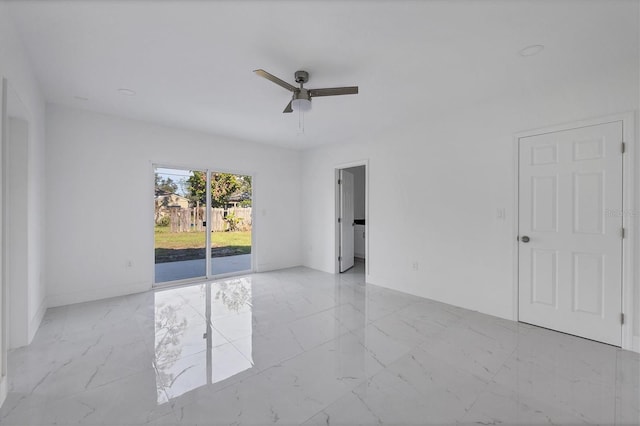 spare room featuring ceiling fan