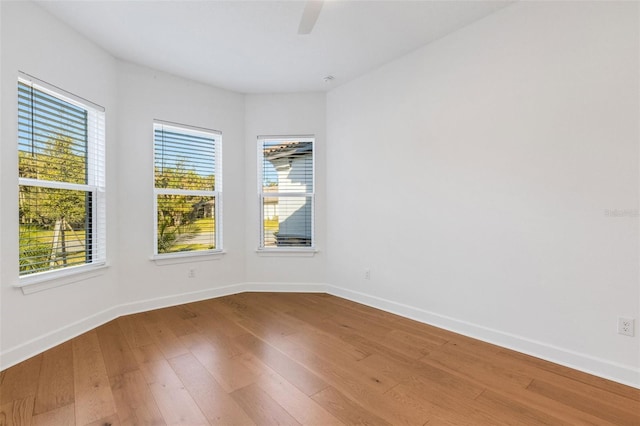 empty room featuring wood-type flooring