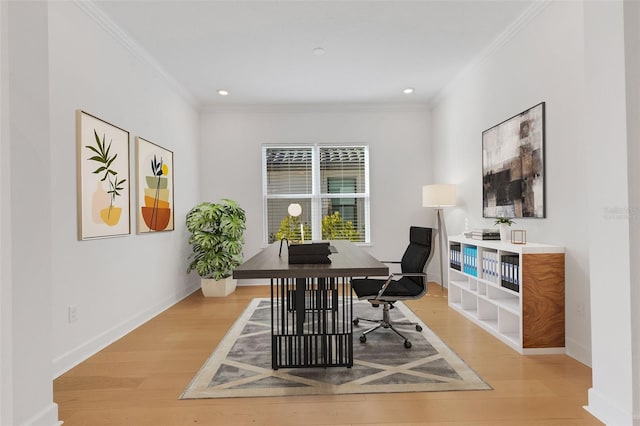 office featuring baseboards, wood finished floors, and ornamental molding