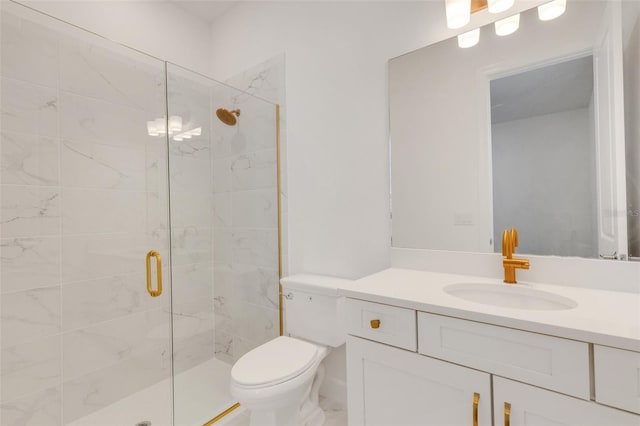 bathroom featuring a stall shower, toilet, and vanity