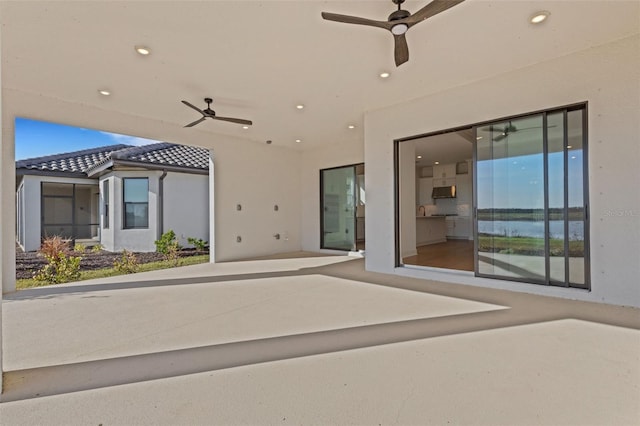 view of patio featuring a ceiling fan