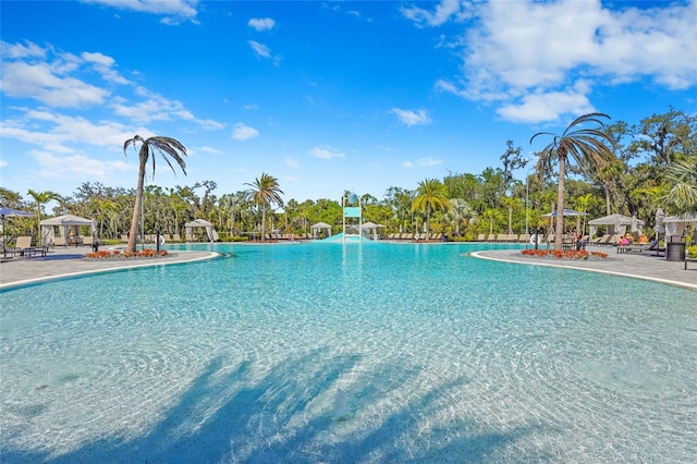 view of swimming pool with a gazebo