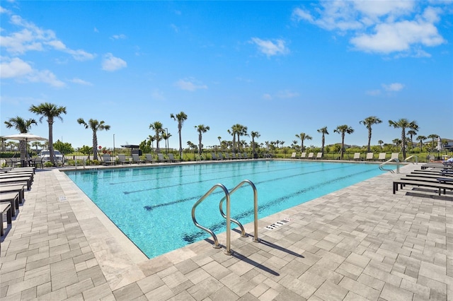 community pool featuring a patio area