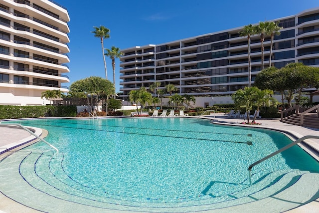 view of swimming pool featuring a patio area