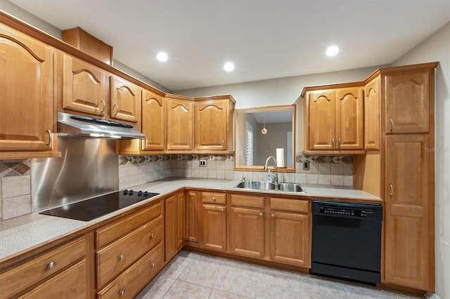 kitchen with black appliances, backsplash, light tile patterned floors, and sink