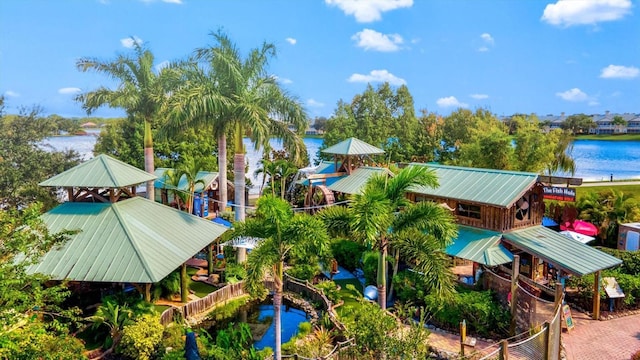 birds eye view of property with a water view